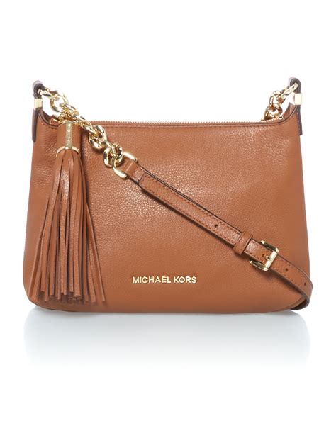 vintage michael kors purse tan|Michael Kors tan tote bag.